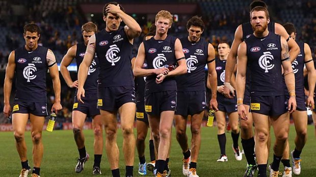 Dejected Blues leave the field after losing to Hawthorn in round 12.