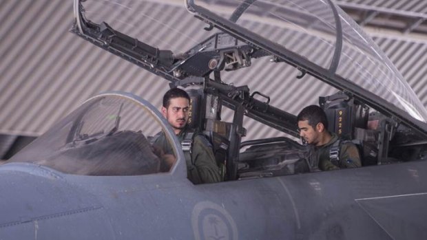 Saudi Arabian air force pilots after taking part in the air strikes.