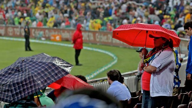 Rain, rain, go away ... light drizzle caused the abandonment of play in Australia's one-dayer against Sri Lanka.
