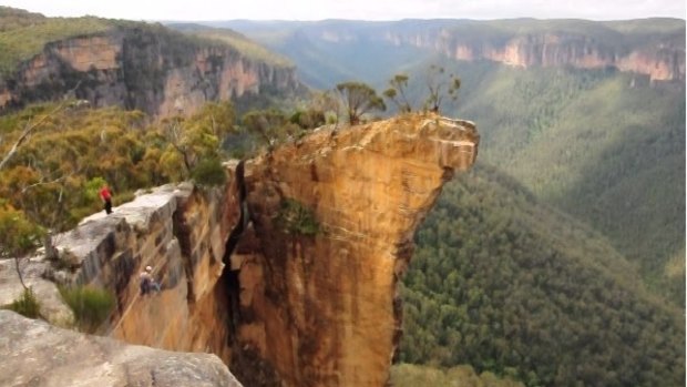 People swing from Hanging Rock in the Blue Mountains in 2011