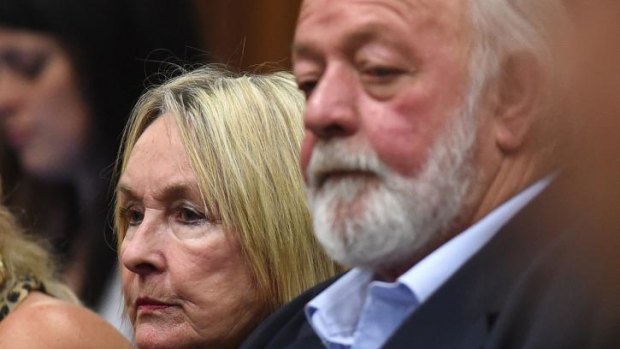 Dignified silence ... The parents of victim Reeva Steenkamp, June (left) and Barry listen to the ruling.