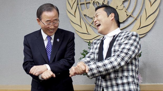 Ill advised ... Ban Ki-moon attempts a Gangnam Style dance move with Psy.
