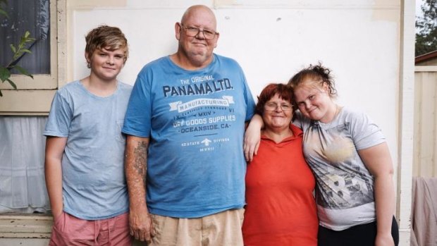 <i>Struggle Street</i> participants: Ashley (second left) and Peta (third left) Kennedy and their family. 