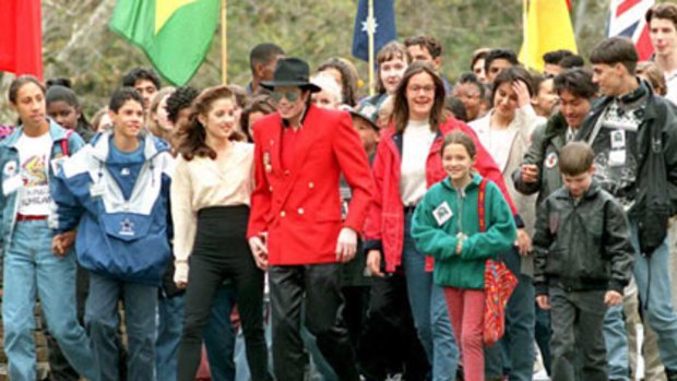 A fallen icon ... Michael Jackson holding hands with then wife Lisa Marie Presley at Neverland,