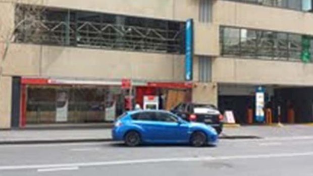 The Porsche was used to crash into the bank, while the blue Subaru WRX was used as the getaway car.