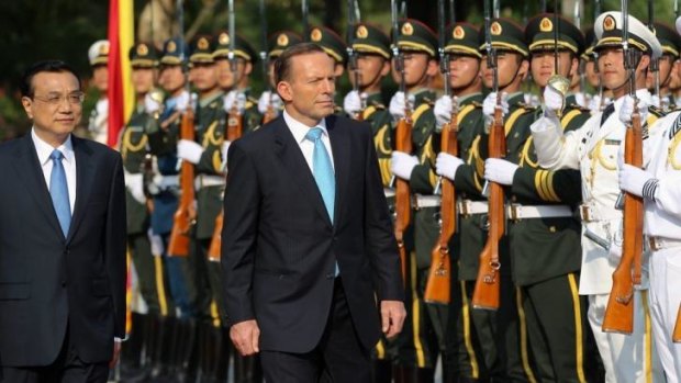 Prime Minister Tony Abbott and Chinese Premier Li Keqiang in Sanya, China.