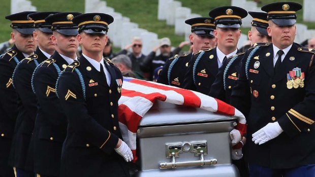 Last rites ... a military honour guard carries the coffin of Army Corporal Frank Buckles during a funeral service at Arlington National Cemetery.