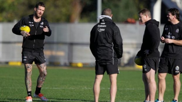 Dane Swan makes a point during training on Sunday.