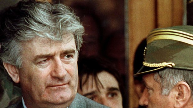 Radovan Karadzic listens to former Bosnian Serb Army Commander General Ratko Mladic in May 1993.