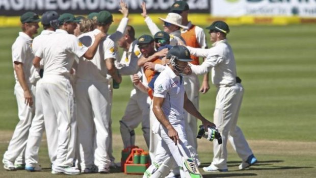 Australia celebrate the wicket of Faf du Plessis during the third and deciding Test in Cape Town. Three-test series may be a thing of the past.