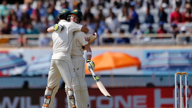 Breakthrough: Smith congratulates Glenn Maxwell on his maiden Test century.