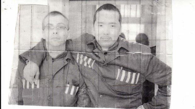 “I was scared out of my mind” … Troy Bremer (at left) with a fellow inmate, Mongolian Batar Batuka, at Beijing’s Municipal prison No 2.