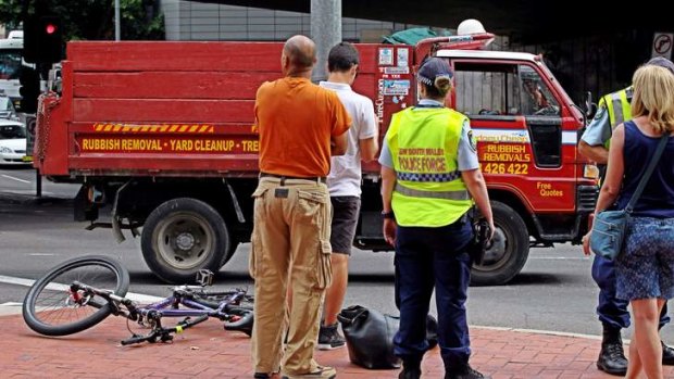 A cyclist was hurt when he was involved in a collision with a truck.