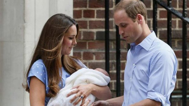 New baby: Kate and William hold Prince George.