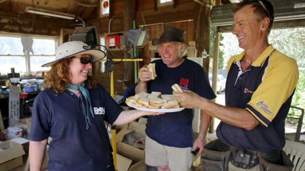 Lisa Pottenger with volunteer builders Peter Fisher and Peter Ratten yesterday.