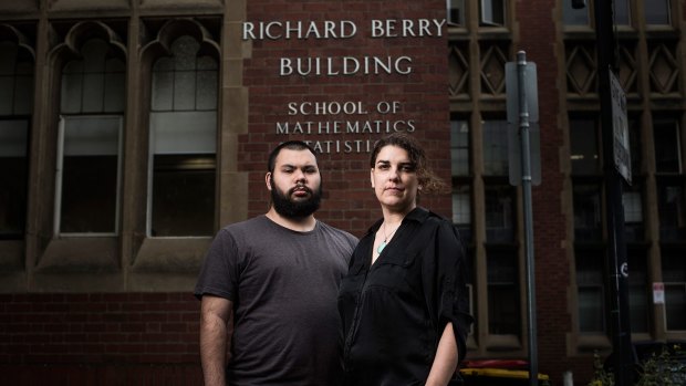 Tyson Holloway-Clarke and Odette Kelada outside the Richard Berry building at the University of Melbourne.