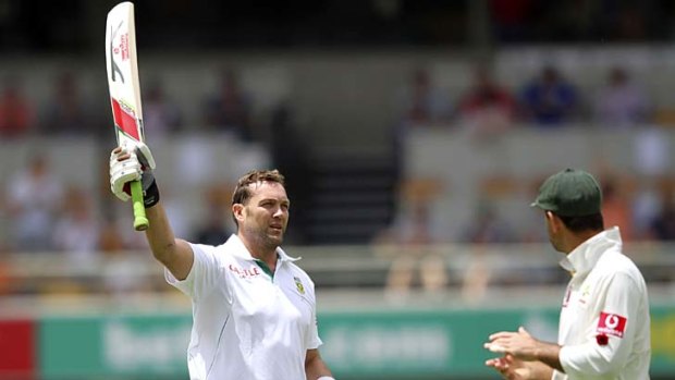 Last of the "undroppables" ...  Ricky Ponting, right, applauds South Africa's Jacques Kallis during the first Test at the Gabba on November 11.