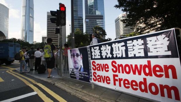 Campaign: A banner supporting Edward Snowden in Hong Kong's CBD.