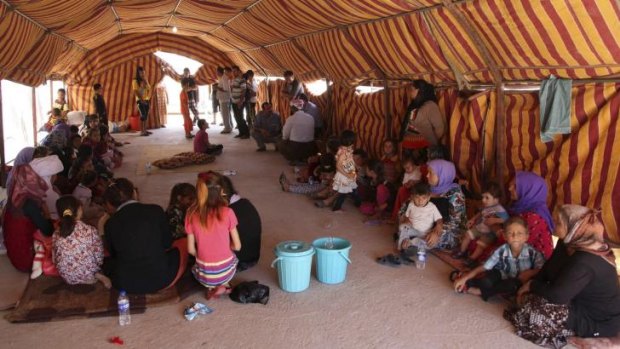 Yazidi families, fleeing the violence in Sinjar, take refuge in Dohuk.