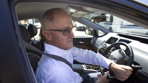 Communications Minister Malcolm Turnbull leaves his Sydney home on Friday.
