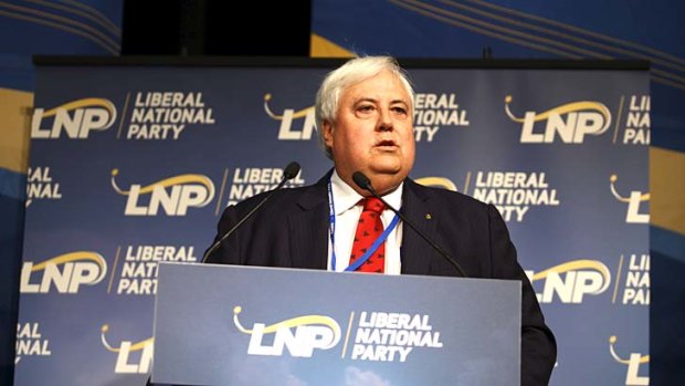 Web of intrigue ... Clive Palmer addresses the LNP convention in Brisbane.