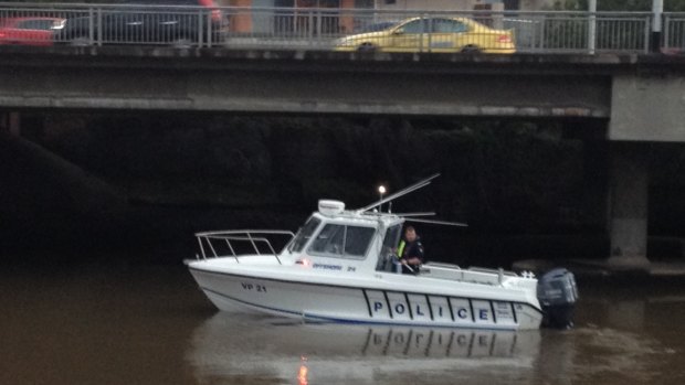 Police search the Maribyrnong River after new tip in the search for missing mother Karen Ristevski. Photo Emily Woods