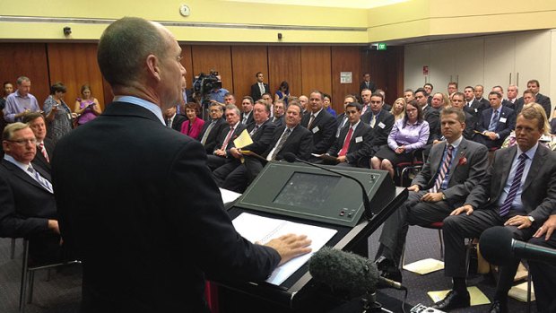 Premier Campbell Newman presides over a mammoth LNP party room meeting.