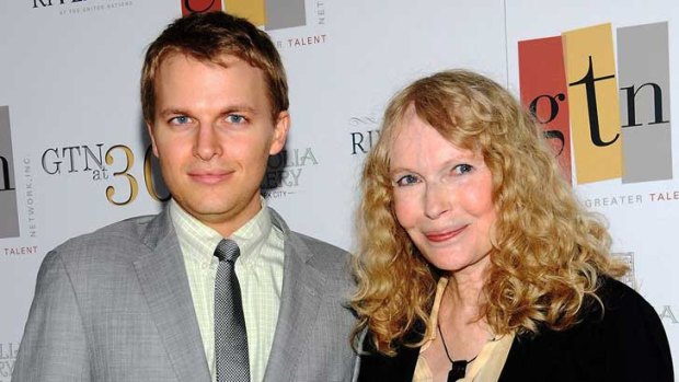 Ronan Farrow, with mother Mia.