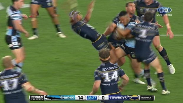 Air mail: Johnathan Thurston was sent flying through the air by Valentine Holmes.