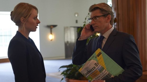 Chelsie Preston Crayford as media adviser Sophie Walsh with David Wenham as Deputy Prime Minister Ian Bradley in the ABC TV political thriller The Code, which was shot in Parliament House.