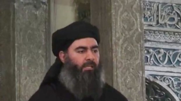 Abu Bakr al-Baghdadi, wearing the watch that has captured social media attention. 