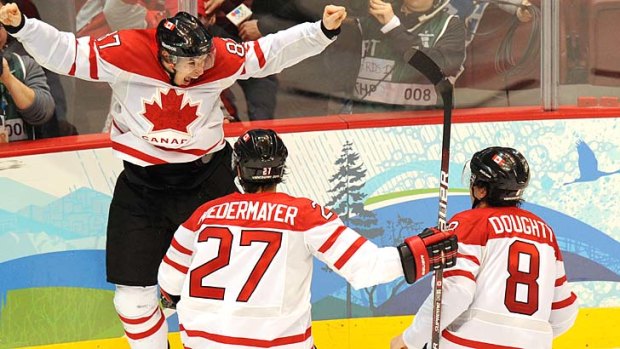 Relief and ecstasy. Canadian forward Sidney Crosby (C) celebrates with teammates Scott Niedermayer (L) and Drew Doughty as Canada's team win gold on home ice, 2010.