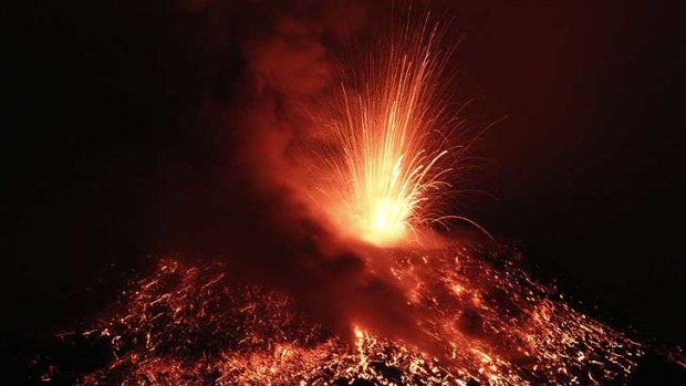 Volcanic display ... Tungurahua shoots lava into the night sky.