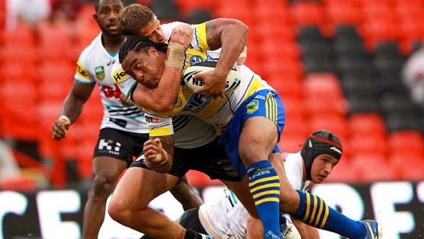 Fuifui Moimoi of the Eels is tackled.