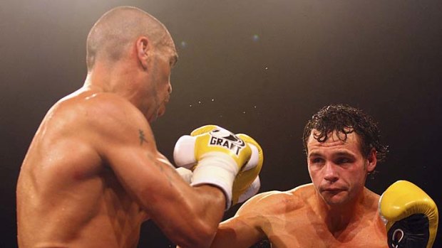 Harsh words: Anthony Mundine and Daniel Geale fight in 2009.