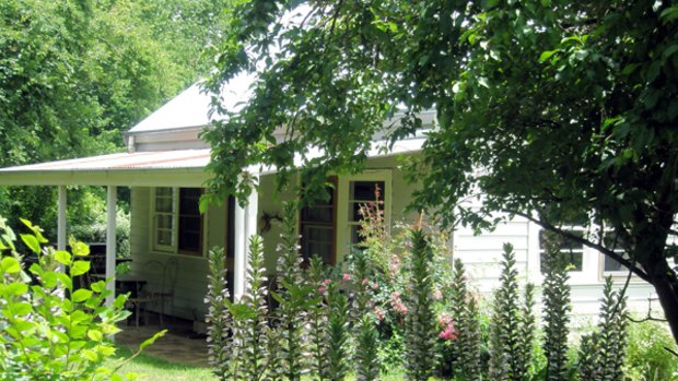 Genteel ... stylish furniture and friendly critters are found at Summerlees Cottage in the history-rich Southern Highlands