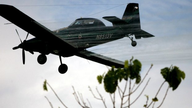 A plane sprays coca fields with weedkiller in Colombia in 2006 to eliminate plants that are the source of cocaine. 