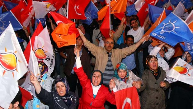 Victorious AKP supporters congratulate Turkish Prime Minister Recep Tayyip Erdogan.
