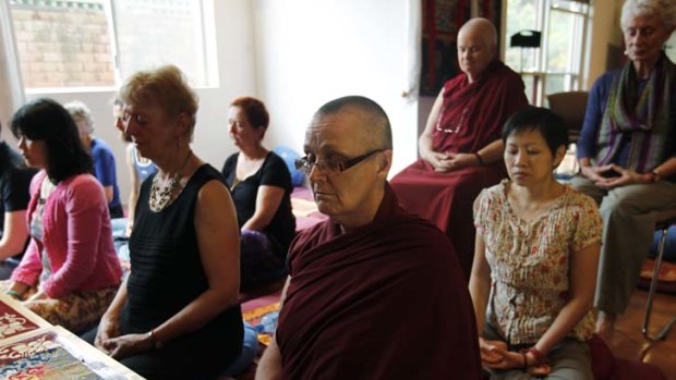 Mind matters &#8230; Venerable Thubten Chokyi, centre, and other nuns and practitioners meditate at the Vajrayana Institute.