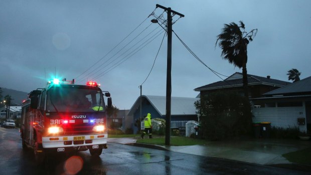 A NSW Fire and Rescue unit attends power lines down in Coledale, near Wollongong. 
