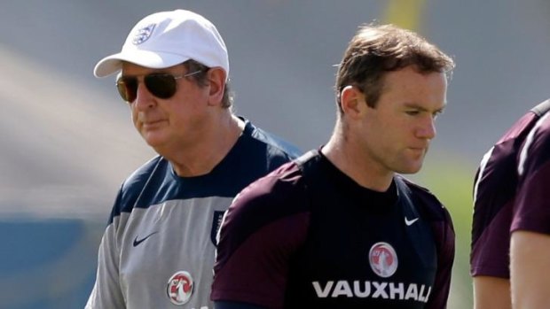 England coach Roy Hodgson and striker Wayne Rooney.