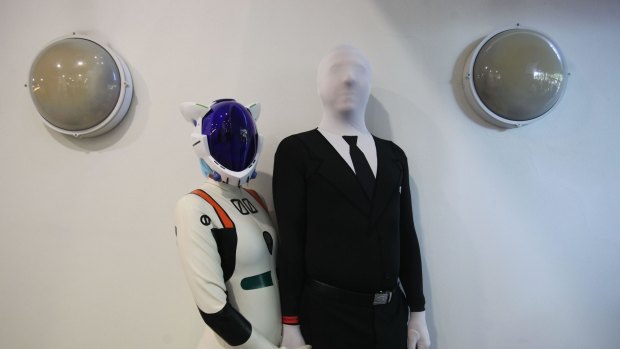 Simon Triamtafillou dressed as Slender Man and Rachel Fletch as Rei Ayanami from an animation during 2015 Supanova at Sydney Showgrounds on June 20.  