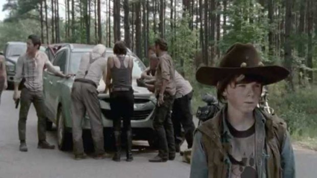 Carl on the look out ... The Walking Dead