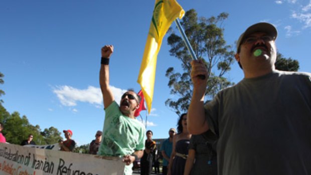 Resentment... refugee activists at Villawood. Police were called in to prevent a confrontation with the Australian Protectionist Party.