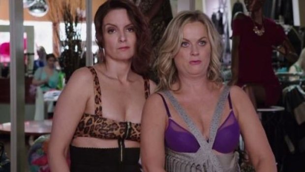 <i>Sisters</i> stars Tina Fey and Amy Poehler getting ready for the kegger. 
