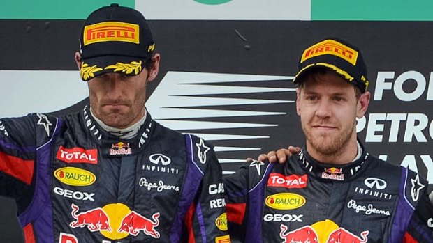 No mood to celebrate: Sebastian Vettel, right, and Mark Webber.