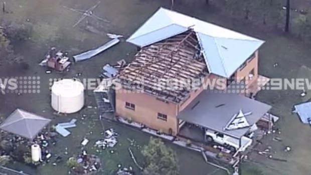 An aerial shot of a property that lost its roof at Fernvale after a savage storm hit the region.