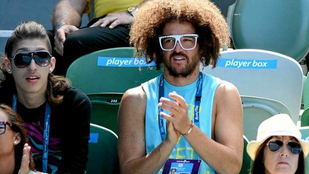 No kiss and tell ... Stefan 'Redfoo' Gordy of the American electro duo LMFAO watches Azarenka at the Australian Open.