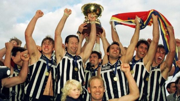 The Port Adelaide Magpies celebrate their 1996 SANFL premiership win