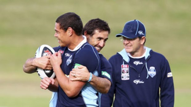 Claims that it improves strength ... Timana Tahu and Andrew Johns wear the Power Balance wrist bands.